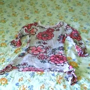 A flowery top for a little girl